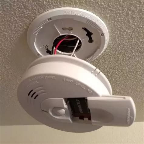 can i install a battery smoke detector over electrical box|replace battery on smoke detector.